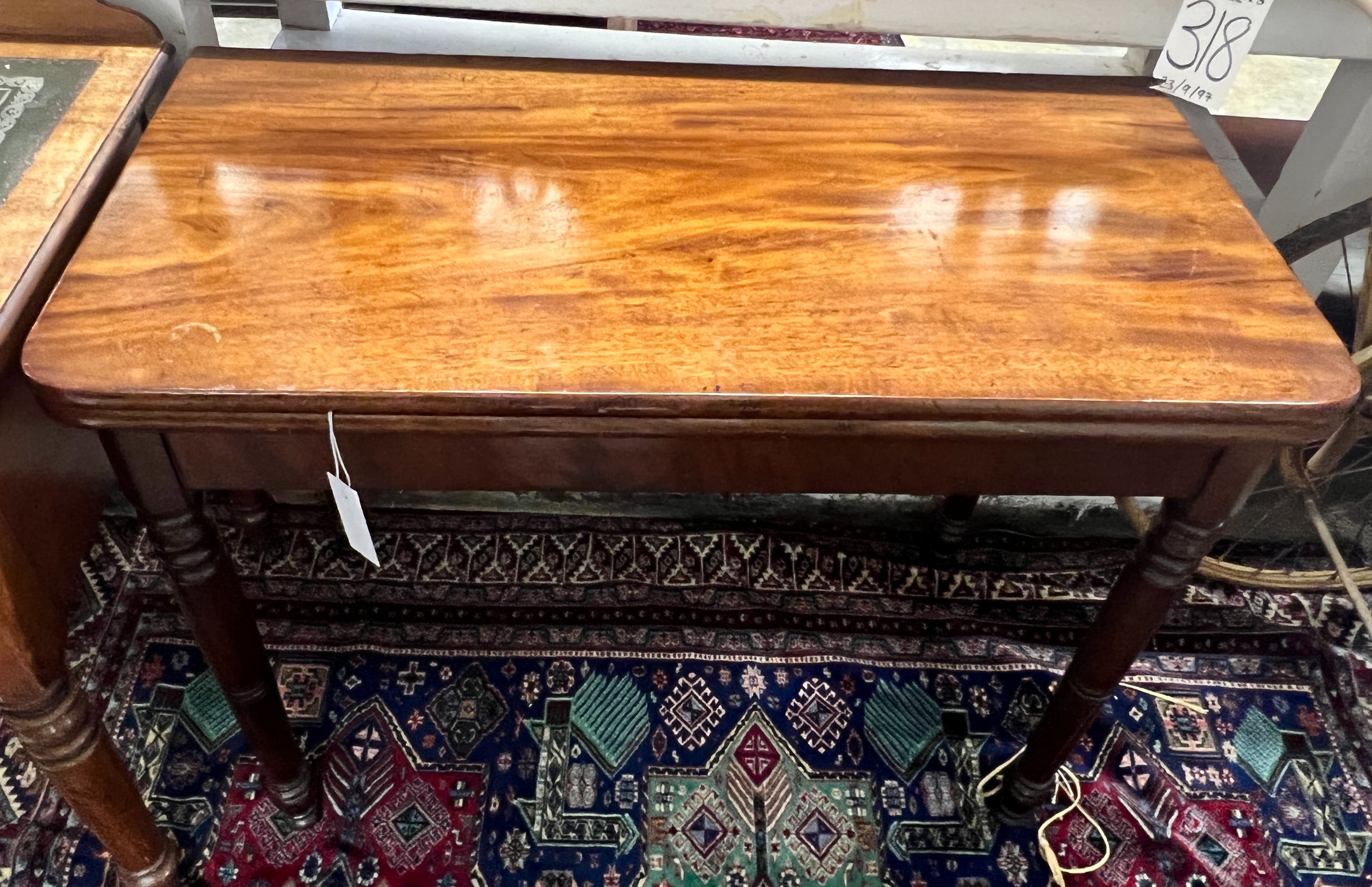 A Regency rectangular mahogany folding tea table, width 90cm, depth 45cm, height 74cm